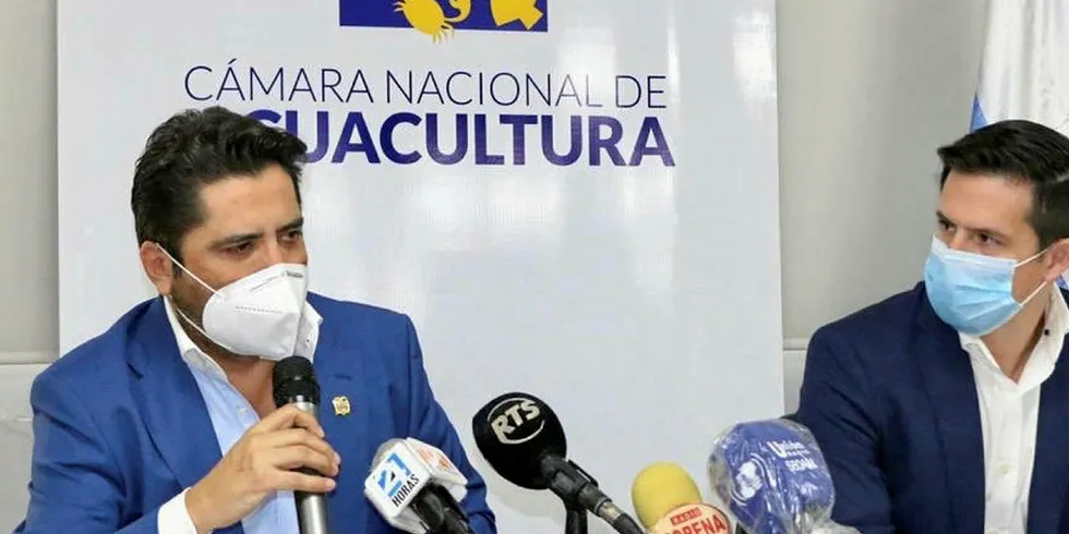 CNA President Jose Antonio Camposano (right), listens as Ecuador's Minister of Production, Foreign Trade, Investments and Fisheries Ivan Ontaneda speaks during a press conference on Monday.