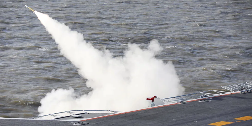 Missile being fired from the Liaoning aircraft carrier during past military drills off China.