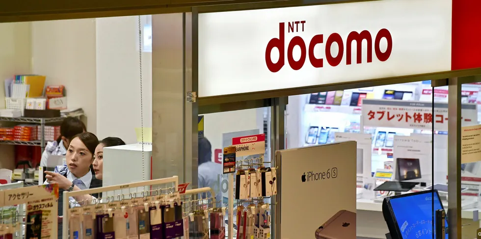 The logo of Japanese mobile giant NTT Docomo is displayed at a shop in Tokyo.