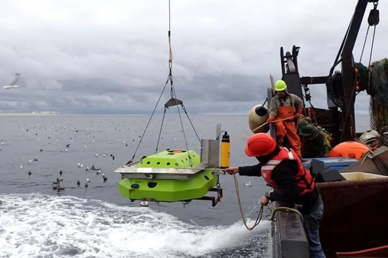 A mooring being deployed from a fishing vessel. Credit: NOAA Fisheries