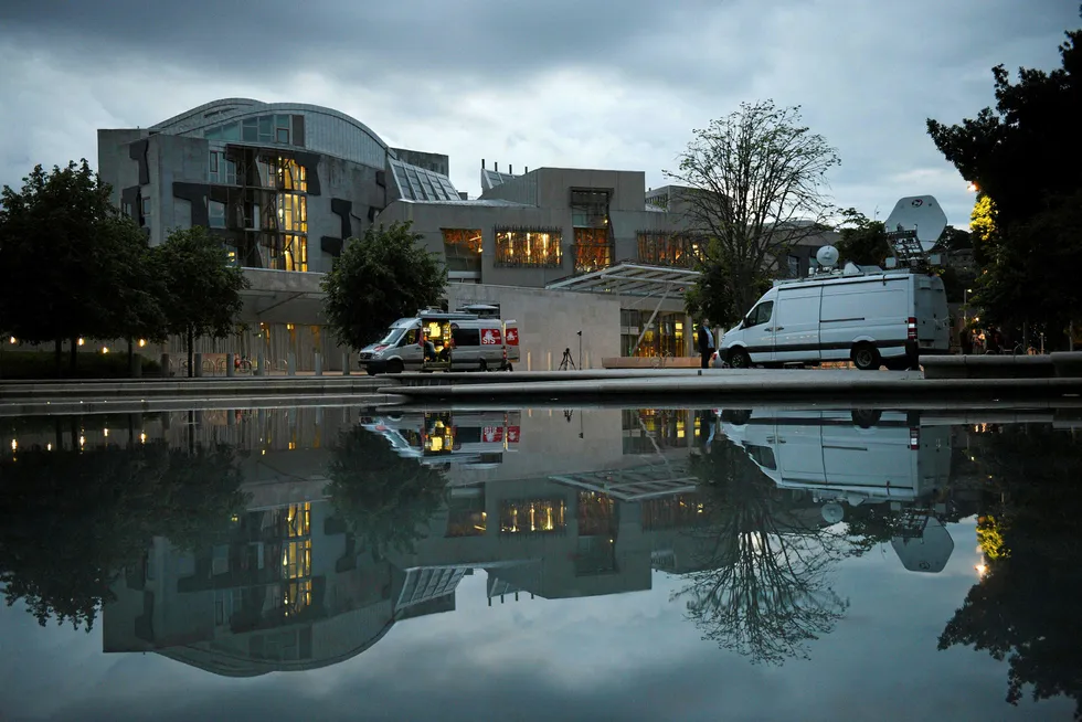 Crisis talks: television trucks outside the Scottish Parliament building in Edinburgh, Scotland