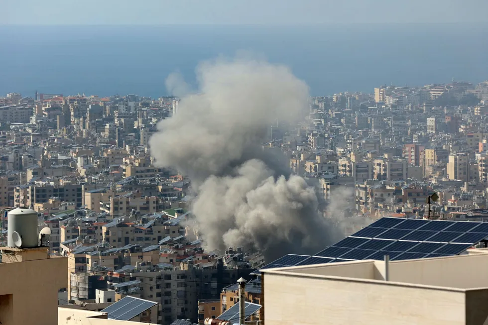 Smoke billows following an Israeli airstrike that targeted Beirut's southern suburbs on 3 October.