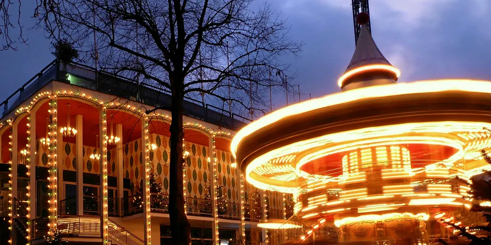 Lights blaze at Copenhagen's famous Tivoli Gardens. Half Denmark's power came from wind and sun last year.