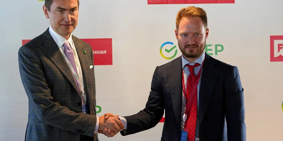 First Deputy Chairman of the Executive Board of SberBank Alexander Vedyakhin (left), with Russian Fishery Company Chairman of the Board Gleb Frank.