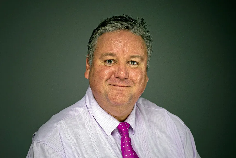 Reasons to smile: Wood’s president of operations in Asia Pacific, Ralph Ellis.