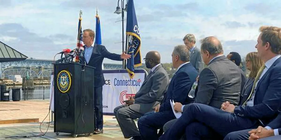 Governor Ned Lamont speaking at the Port of New London earlier this year