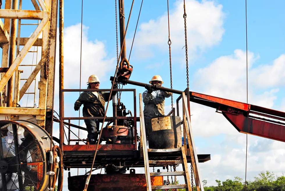 Practical opportunities: workers at a Denbury Resources-operated site in Texas