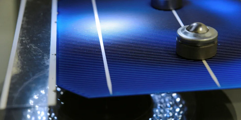 A PV cell on an assembly line in France.