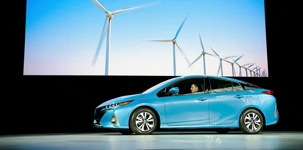 The new model of the Toyota Prius, named the Prius Prime, is introduced at the New York International Auto Show.
