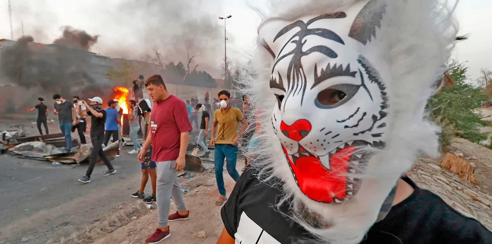 Iraqi protestors demonstrate against a lack of basic services in Basra.