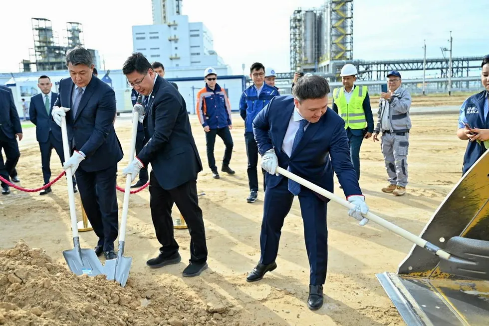 Kazakh governmental officials and executives from country's state oil and gas holding KazMunayGaz at the groundbreaking ceremony for a gas-to-polyethylene project in Kazakhstan.