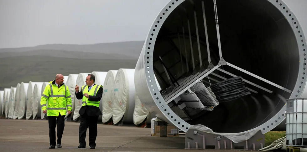 Former First Minister of Scotland Alex Salmond (right) visits the Campbeltown tower facility in 2011