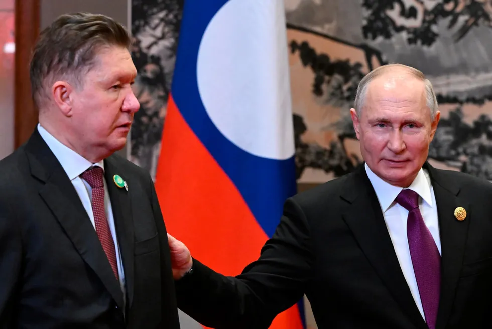 Executive board chairman of Russian Gazprom, Alexei Miller (left) and Russian President Vladimir Putin.