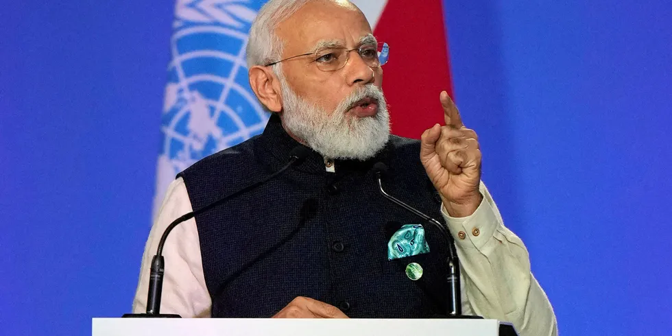 India's Prime Minister Narendra Modi presents his national statement as part of the World Leaders' Summit of the COP26 UN Climate Change Conference in Glasgow.