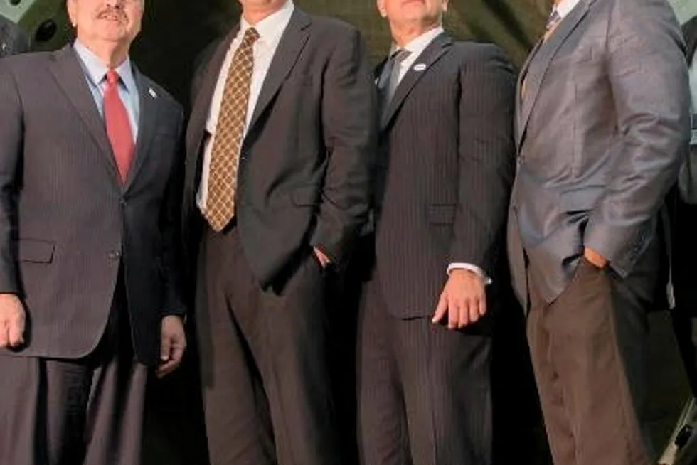 Fehrman new AEP chief. Bill Fehrman (second from left).