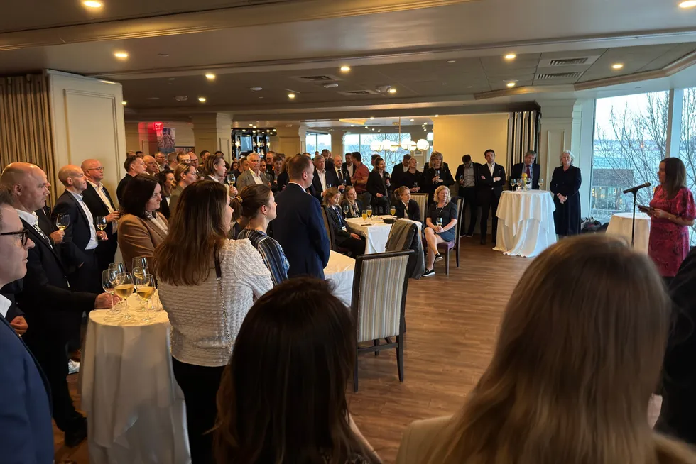 Norwegian Minister of Fisheries Marianne Sivertsen-Naess speaks to the crowd at the Norway seafood reception in Boston on the sidelines of the Seafood Expo North America.
