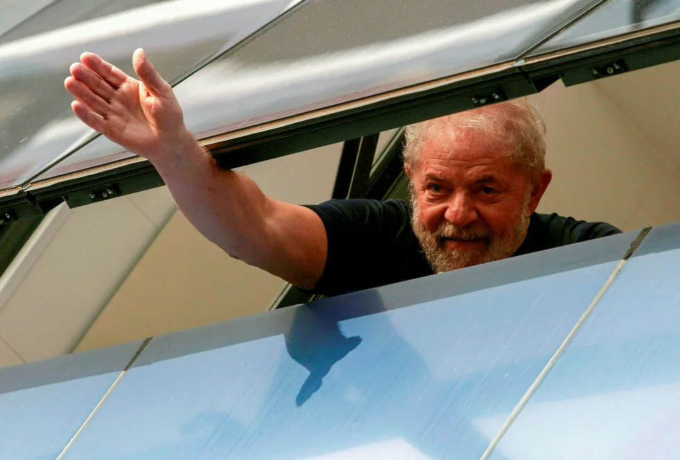 Public support: former Brazilian president Luiz Inacio Lula da Silva waves from a window in Sao Bernardo do Campo, Sao Paulo state, Brazil