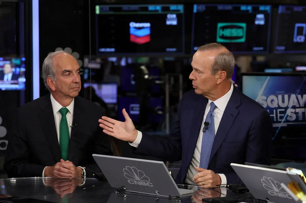 Hopes: Hess chief executive John Hess (left) and Chevron chief executive Mike Wirth