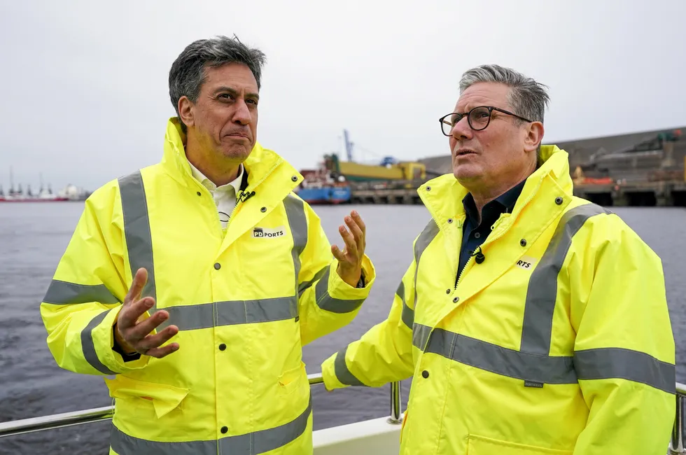 UK Prime Minister Keir Starmer (R), and Secretary of State of Energy Security and Net Zero, Ed Miliband.
