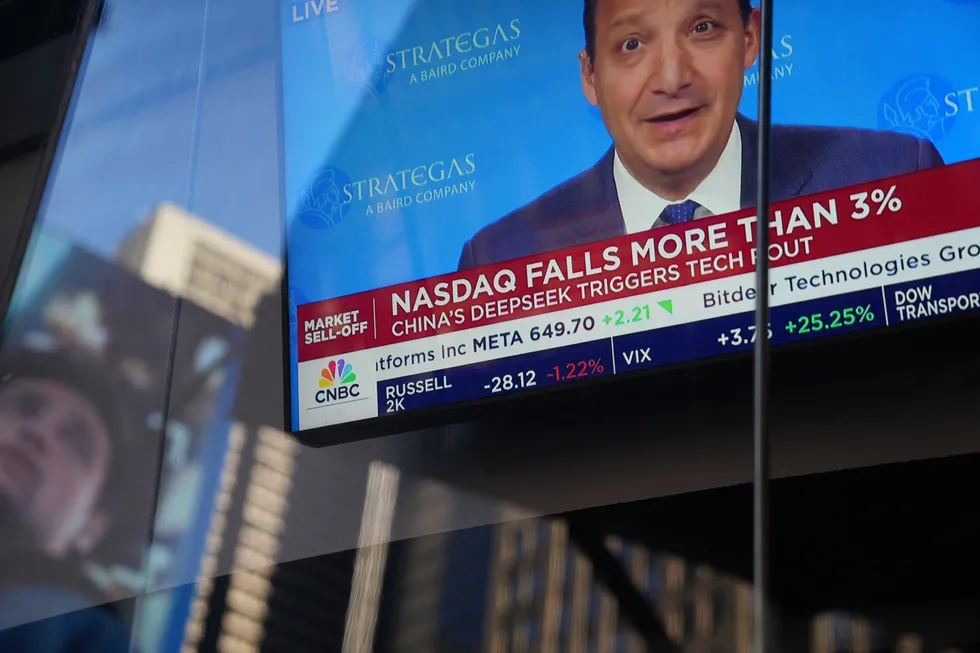 Television graphics are seen in the window of Nasdaq headquarters in Times Square, as Nasdaq fell nearly 4 percent this morning on January 27, 2025 in New York City.