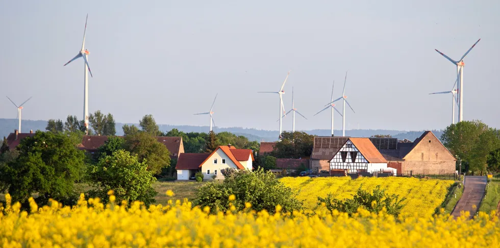 Wind turbines near homes.