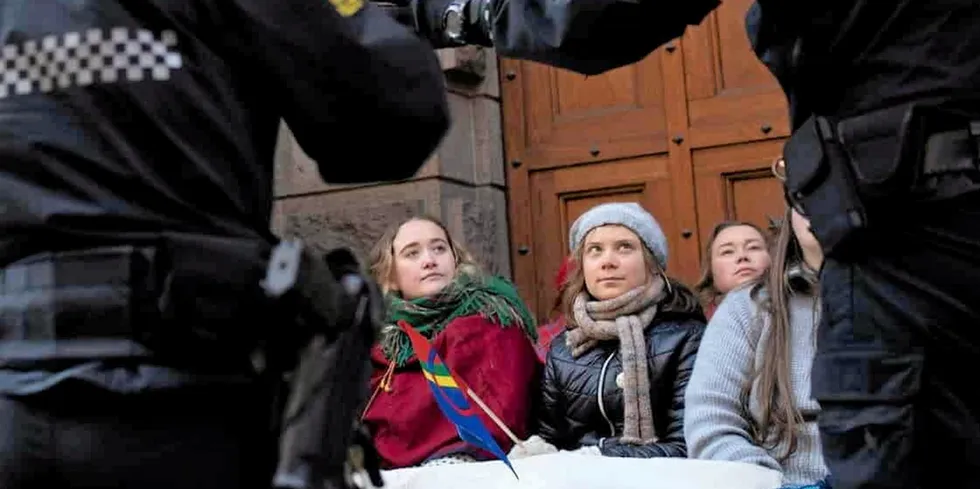 Thunberg and other activists supporting Sami reindeer herders are removed by the police after blocking the entrance to the Ministry of Climate and Environment in Oslo last year.