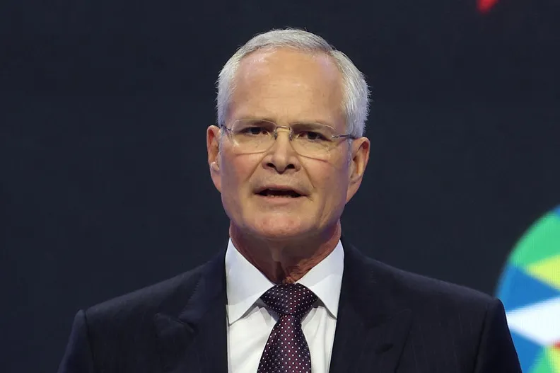 Consistent strategy: ExxonMobil chief executive Darren Woods at the APEC CEO Summit last November