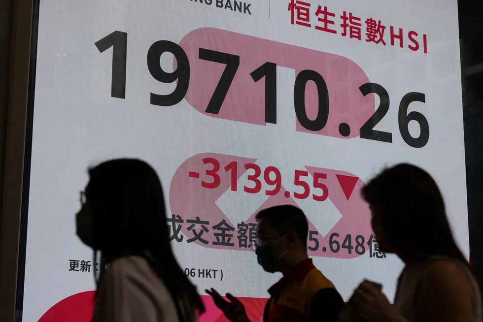 A screen displaying the closing Hang Seng Index in Hong Kong, China, on Monday.