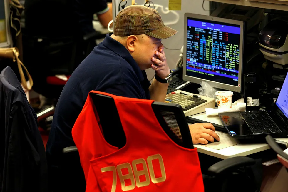 Falling prices: oil fell as US output hit a record 12 million bpd, offsetting Opec-led production cuts