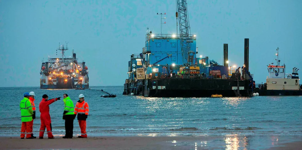 The Western Link cable makes landfall in Scotland during construction.