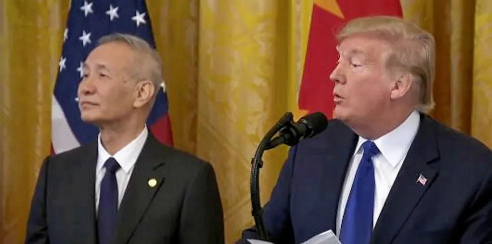 US President Donald Trump with Chinese Vice Premier Liu signing a phase one trade deal on Jan 15, 2019.