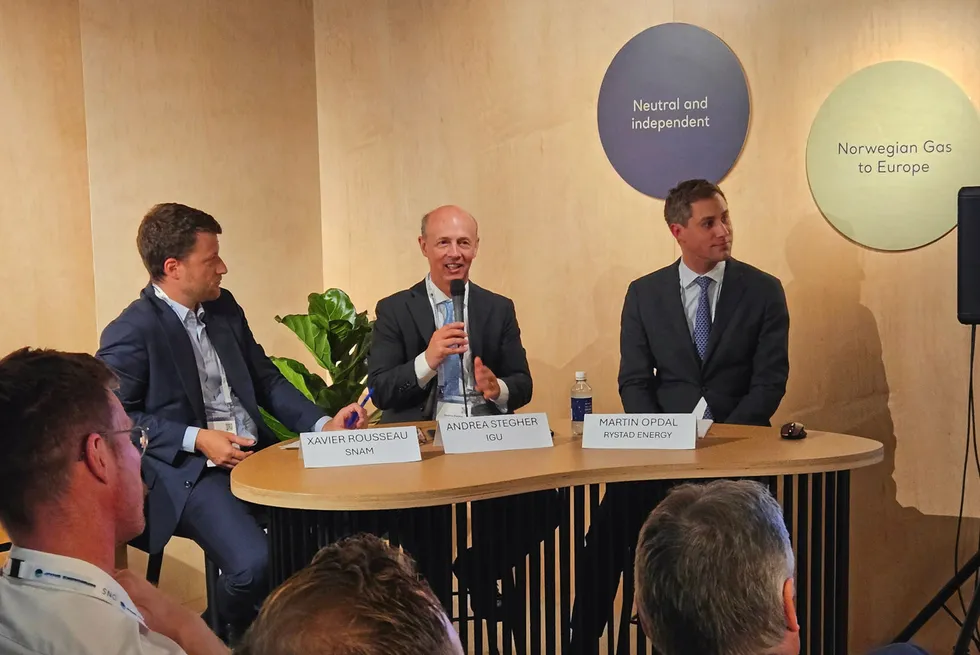 From left to right: Xavier Rousseau of Snam; Andrea Stegher from IGU; and Martin Opdal from Rystad Energy, presenting at the launch of the 2024 Global Gas Report at ONS 2024 on Tuesday.