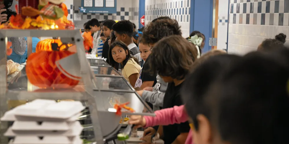 The USDA procures pollock for programs that include its national school lunch program. Pictured above: Children get in line to get their lunch at Annandale Terrace Elementary School in Annandale, VA, Oct. 11, 2023.