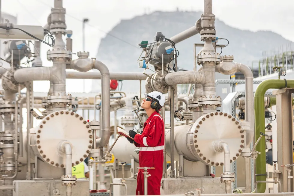Bridge fuel: an inspector checks on the evaporator at gas-fired power plant