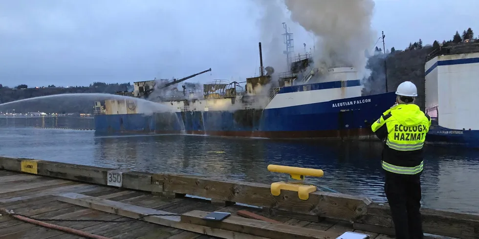 Responders monitor fire suppression efforts on Trident's Aleutian Falcon on Feb. 18, 2021.