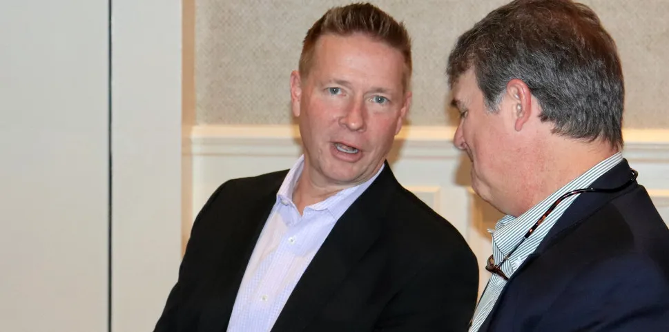 Last month, Blue Harvest Fisheries CEO Keith Decker, center, announced he would be taking on the top role at American Aquafarms, which is being developed by Norwegian executives.