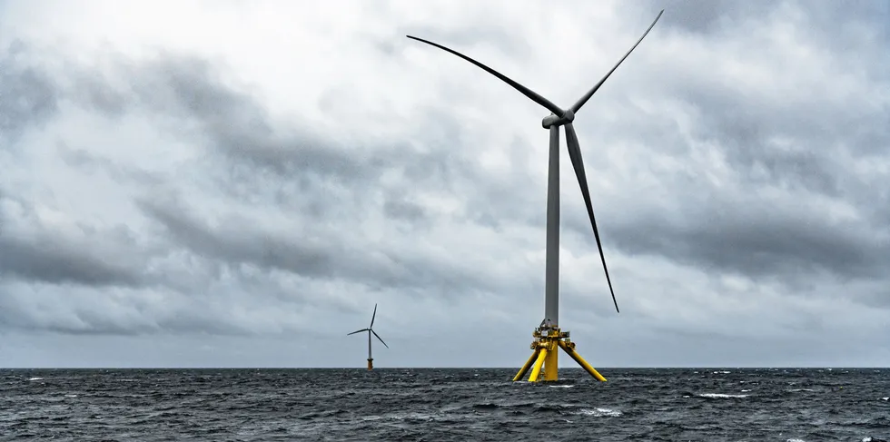 Stiesdal Offshore Technologies' TetraSpar prototype (foreground) with Hywind Demo R&D unit, at MetCentre testing site in Norwegian North Sea