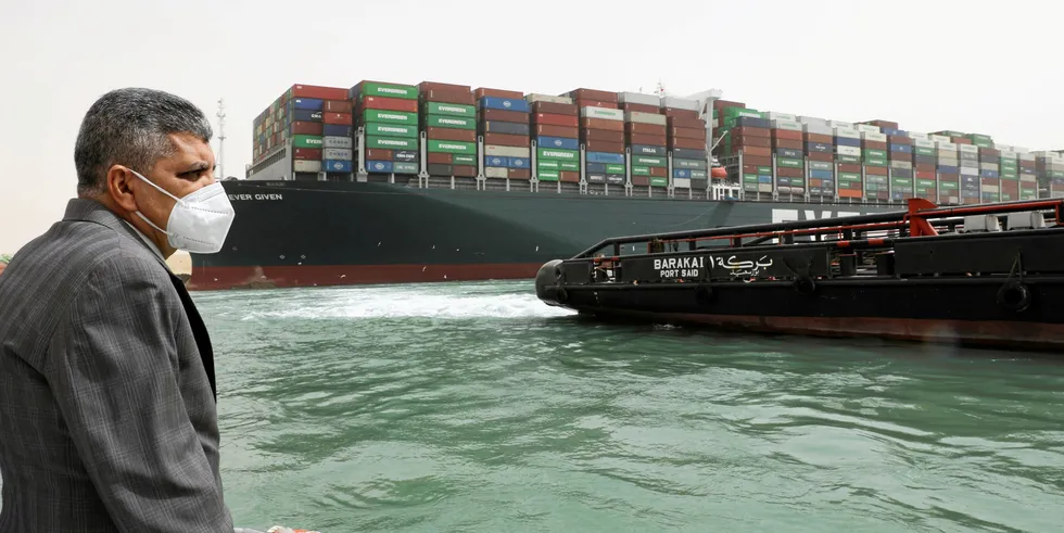 The head of the Suez Canal Authority, Lt. Gen Ossama Rabei, with the Evergreen containership Ever Given, owned by Shoei Kisen, in the distance. The vessel ran aground in the Suez Canal March 23.