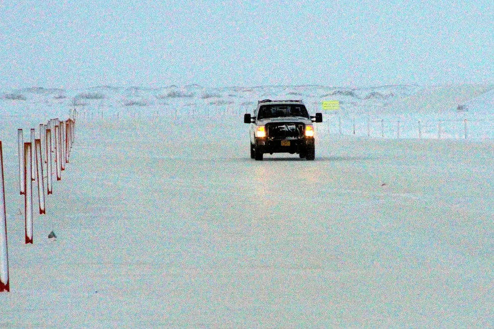 Cold call: a truck driving on an ice bridge in Alaska's North Slope