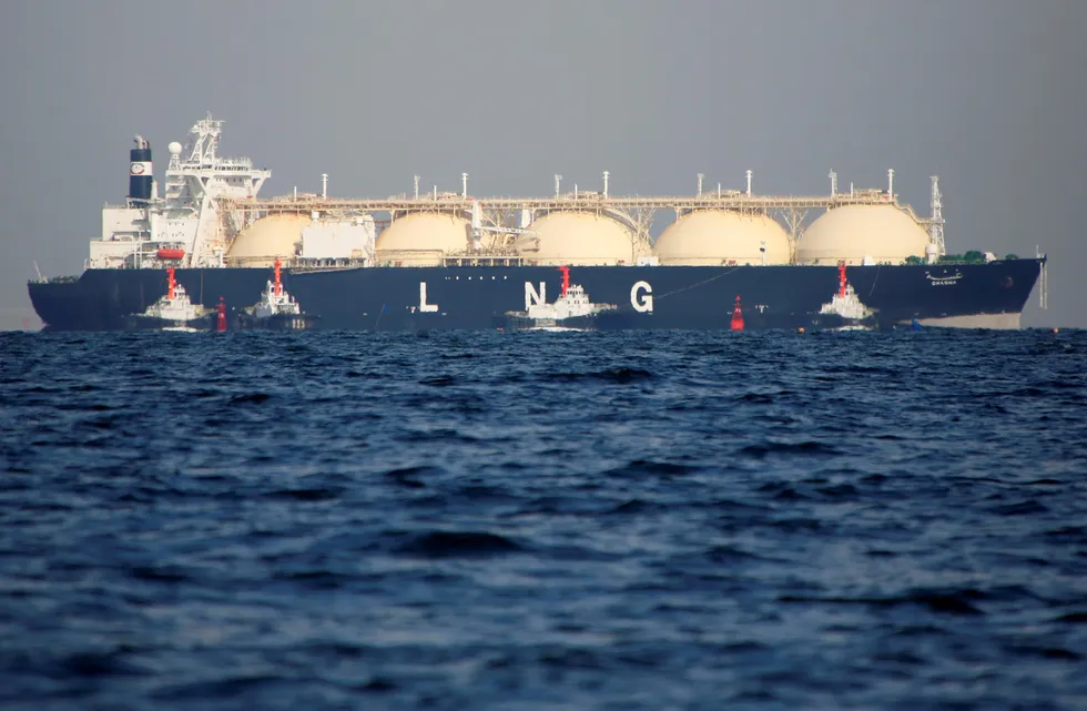 Imports: a liquefied natural gas carrier is tugged towards a thermal power station in Futtsu, east of Tokyo, Japan