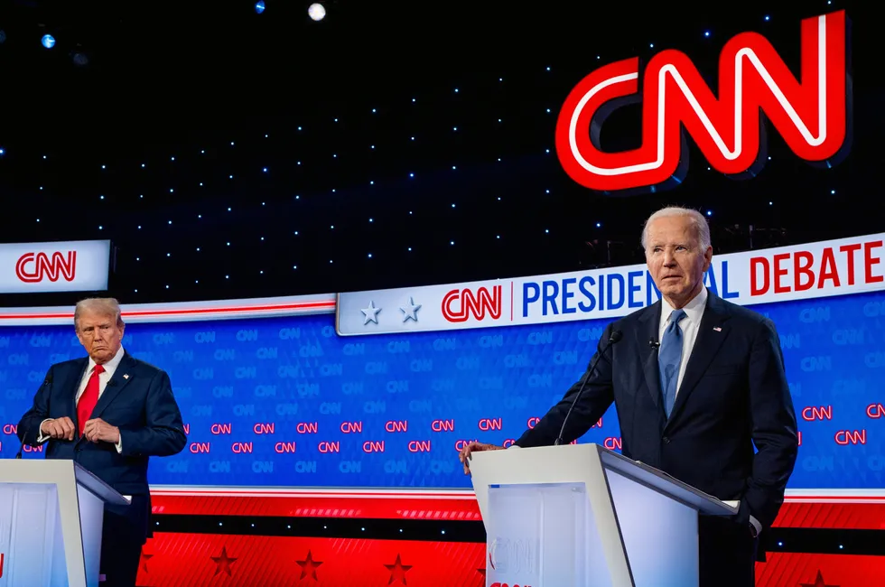 Republican presidential candidate, former President Donald Trump (L) looks at U.S. President Joe Biden during the CNN Presidential Debate at the CNN Studios on June 27, 2024 in Atlanta, Georgia.