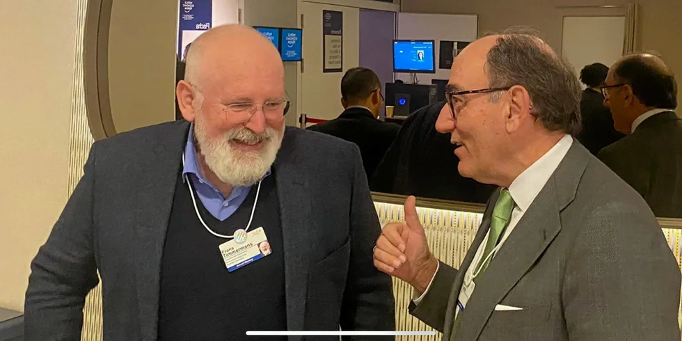Iberdrola CEO Ignacio Galán speaking to EU climate chief Frans Timmermans at Davos this week.