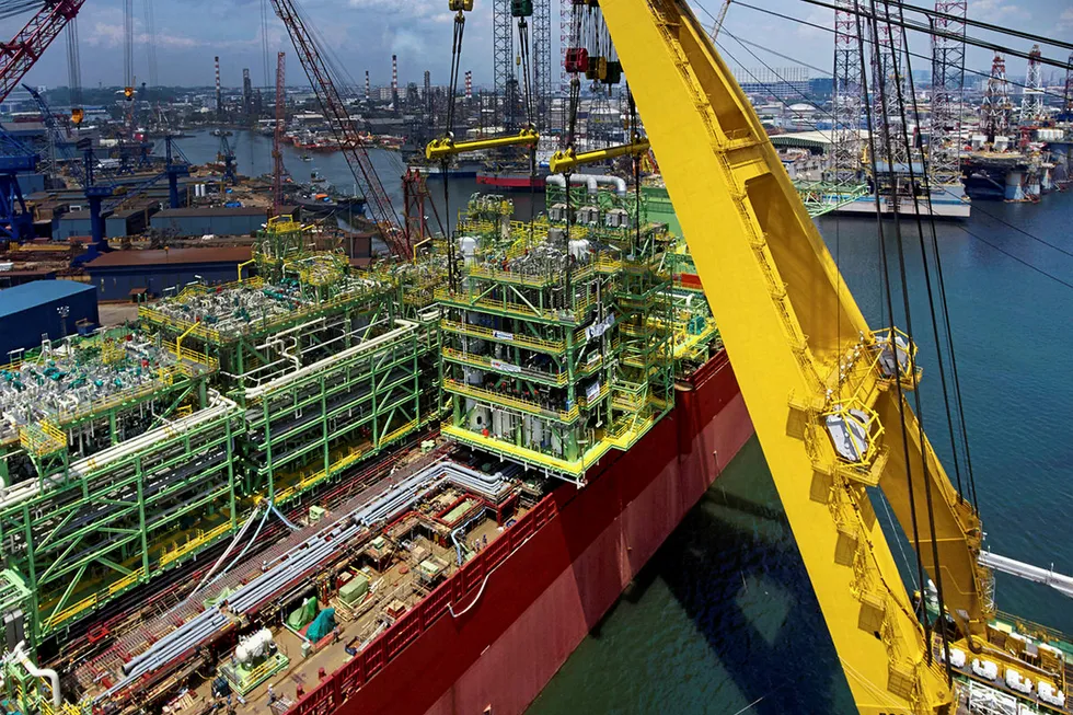 Loading up: a seawater treatment module being lifted onto a production vessel