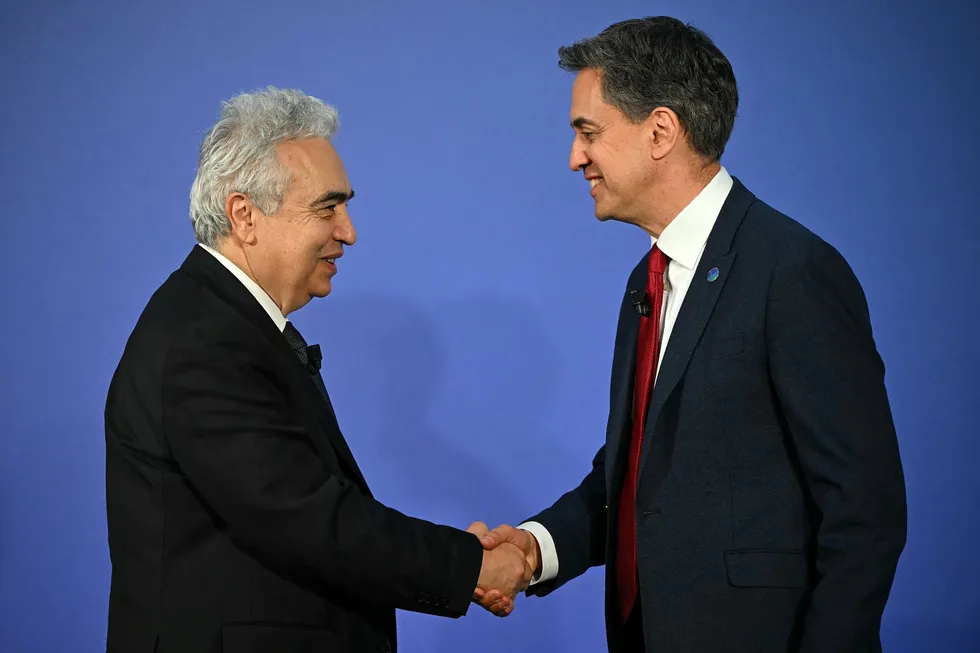 UK Energy Secretary Ed Miliband greets IEA executive director Fatih Birol at the Future of Energy Security Summit, hosted by the International Energy Agency and UK government in London.