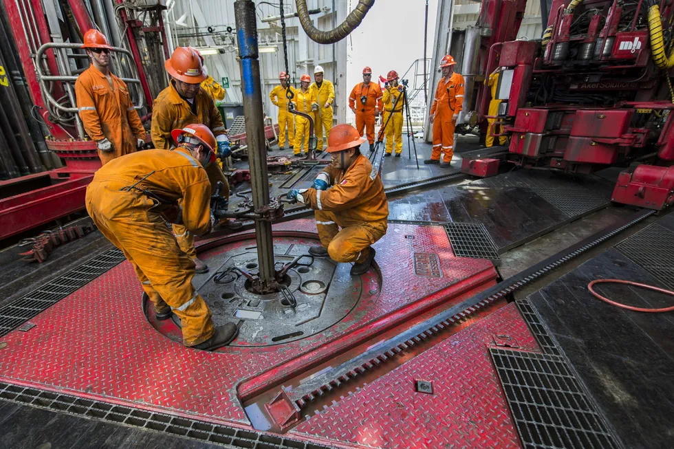Exploration fillip: Derrick hands working on the La Muralla IV semi-submersible in the Gulf of Mexico.