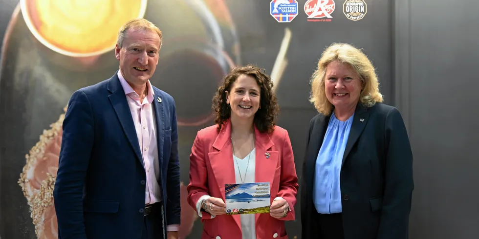 L-R: Tavish Scott, CEO of trade body Salmon Scotland, Scotland's Rural Affairs Secretary Mairi Gougeon, and Su Cox, chair of Scottish Quality Salmon.