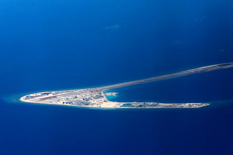 Contested: Chinese structures and an airstrip on the man-made Subi Reef in a disputed area of the South China Sea