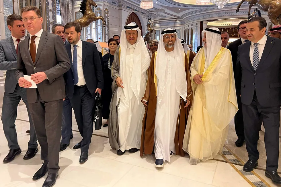Russia's first deputy prime minister Alexander Novak (left) and his counterparts from Saudi Arabia, Prince Abdulaziz bin Salman (centre-left) and the UAE's Suhail Al-Mazroui (centre-right), walk out with other delegates after the end of Opec meeting in Riyadh on Sunday, 2 June 2024.