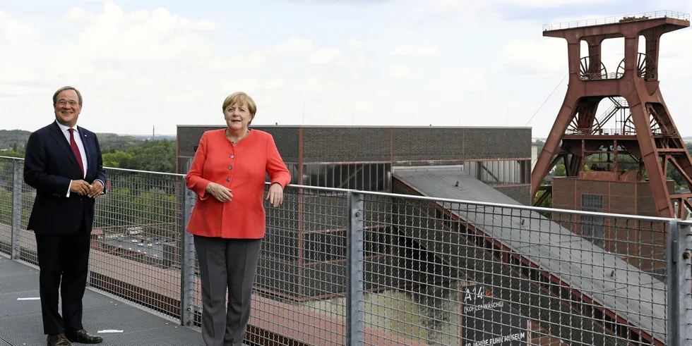 North-Rhine-Westphalia state premier Armin Laschet and Chancellor Angela Merkel visit the Zeche Zollverein former coal mine and coking plant, today a UNESCO World Heritage site
