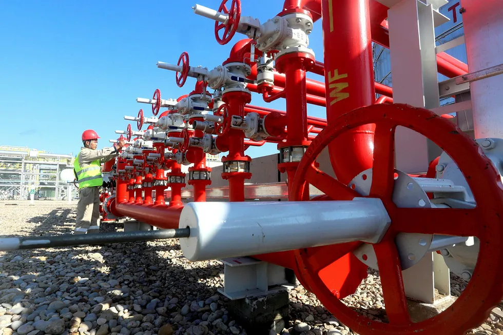 Reserves: A worker at the Halfaya oilfield in Iraq, one of at least four CNPC overseas production bases.